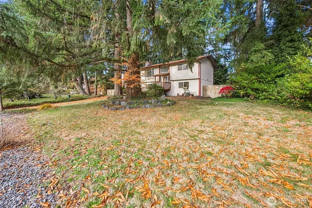 a house view with a backyard space