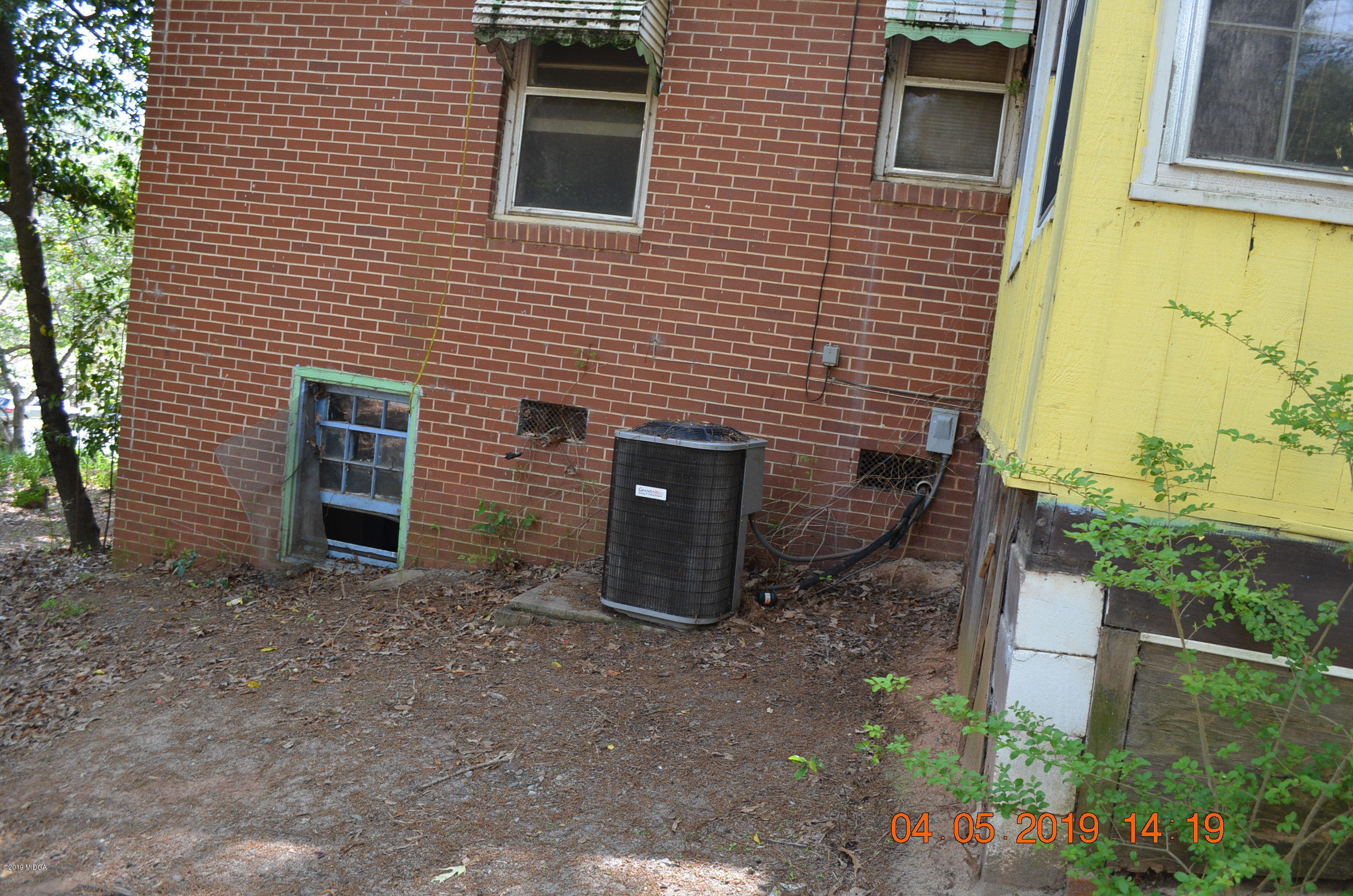 1974 Manson Road Macon, GA 31217 - Photo 11 of 15 a brick building with a door and a door