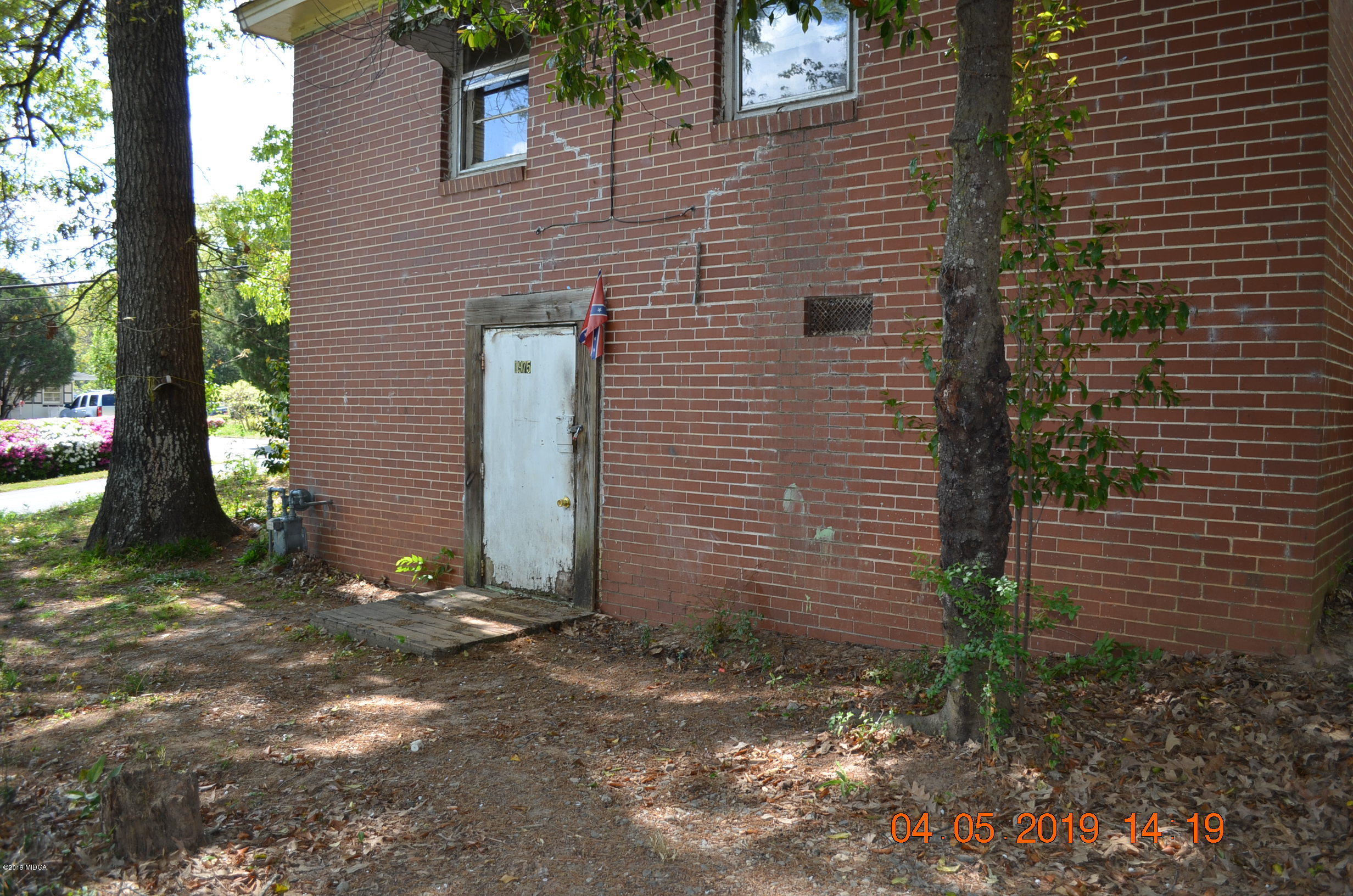 1974 Manson Road Macon, GA 31217 - Photo 12 of 15 a backyard of a house with lots of green space