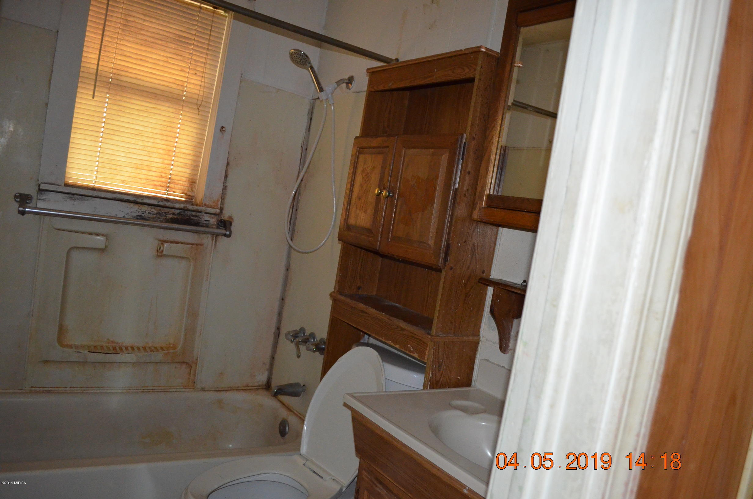 1974 Manson Road Macon, GA 31217 - Photo 4 of 15 a bathroom with a tub and sink