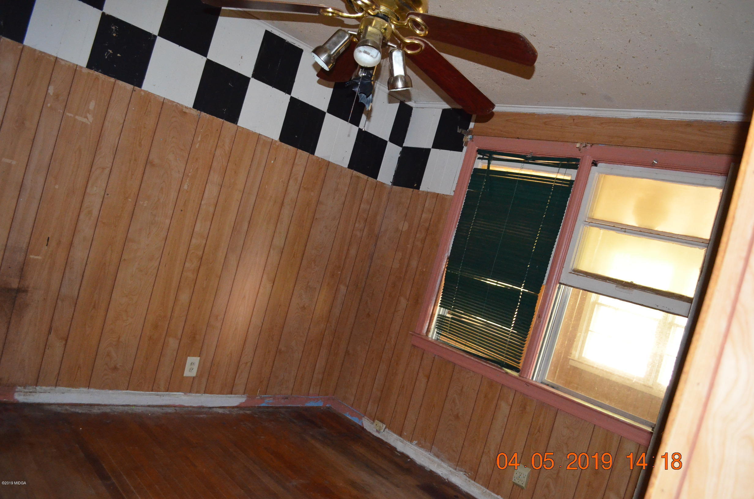 1974 Manson Road Macon, GA 31217 - Photo 8 of 15 a view of an empty room with a window
