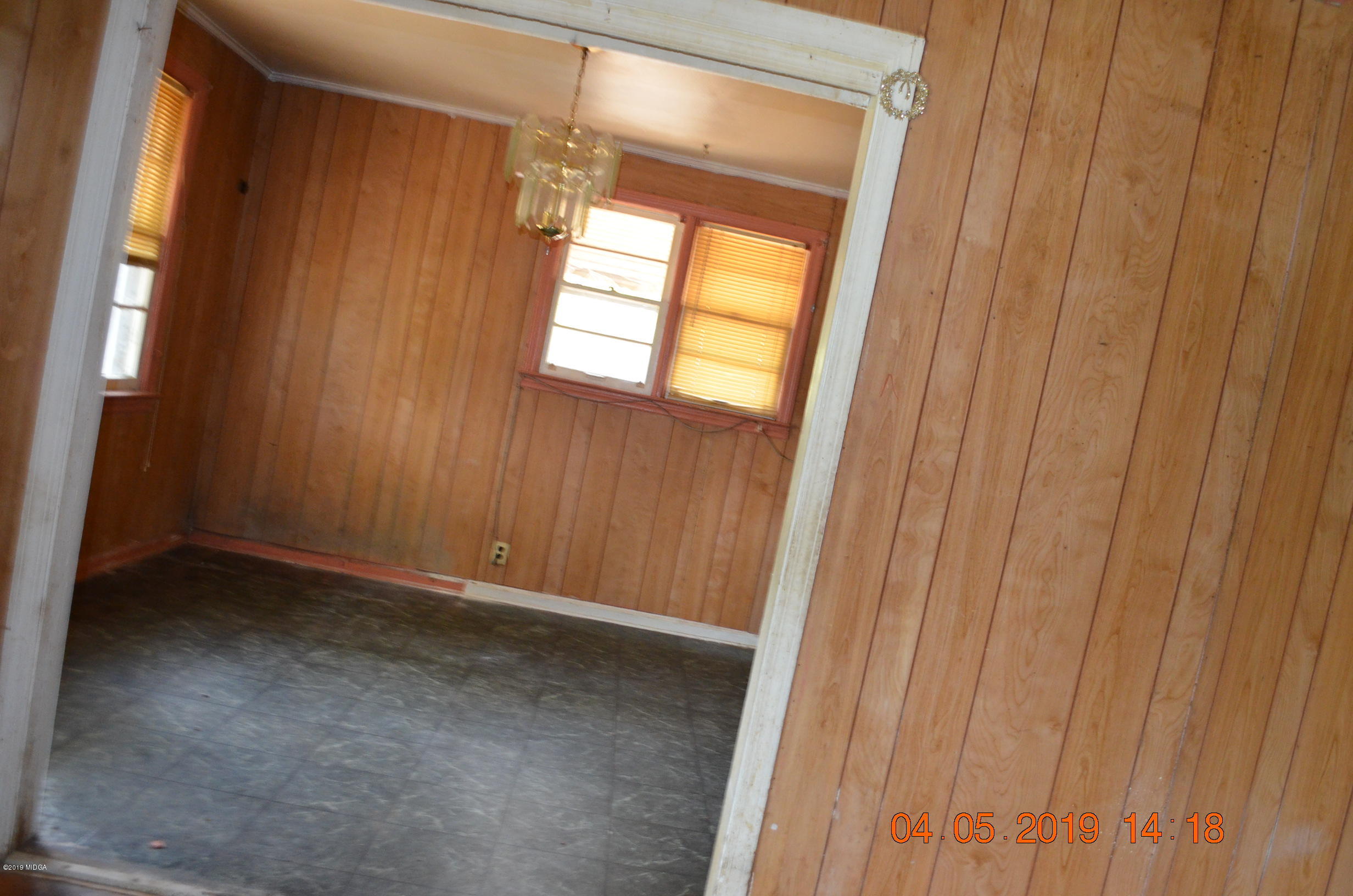 1974 Manson Road Macon, GA 31217 - Photo 9 of 15 a view of an empty room with a window
