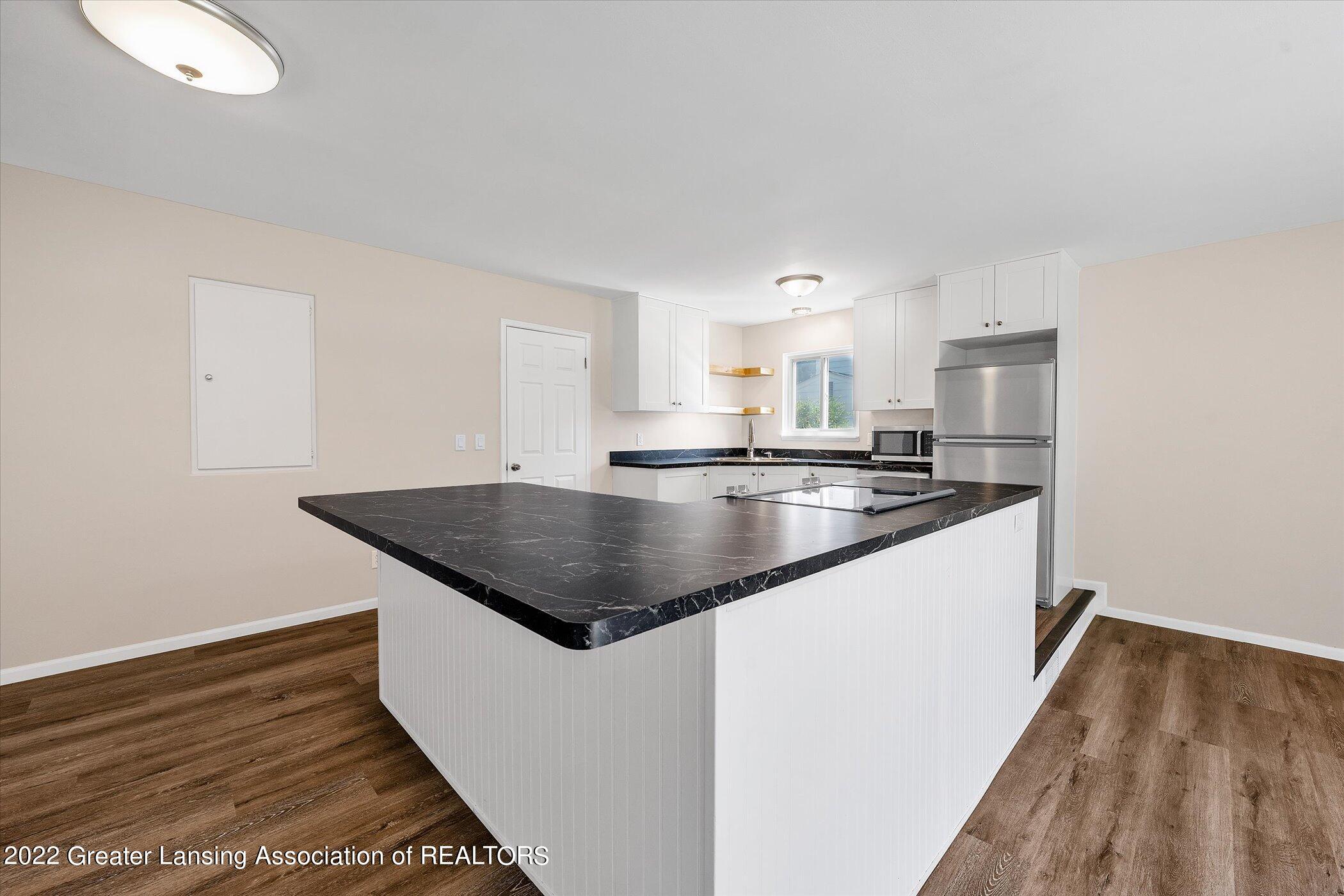 3025 Colchester Road Lansing, MI 48906 - Photo 13 of 35 13-3025-Colchester-Rd-WindowStill-Real-E