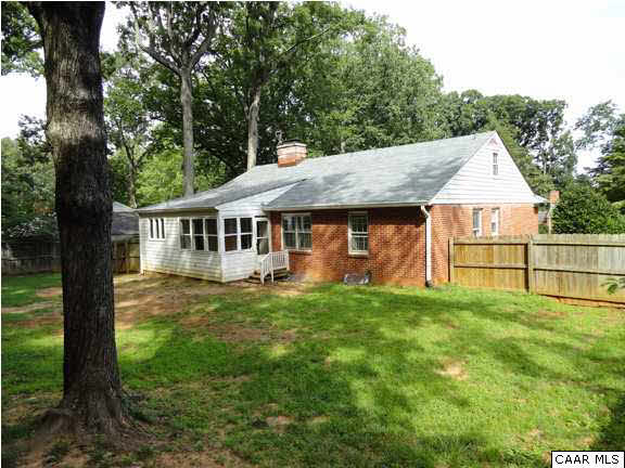 309 Kent Road Charlottesville, VA 22903 - Photo 3 of 24 a view of a house with a backyard and a tree
