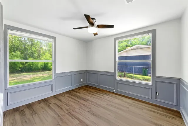 an empty room with windows