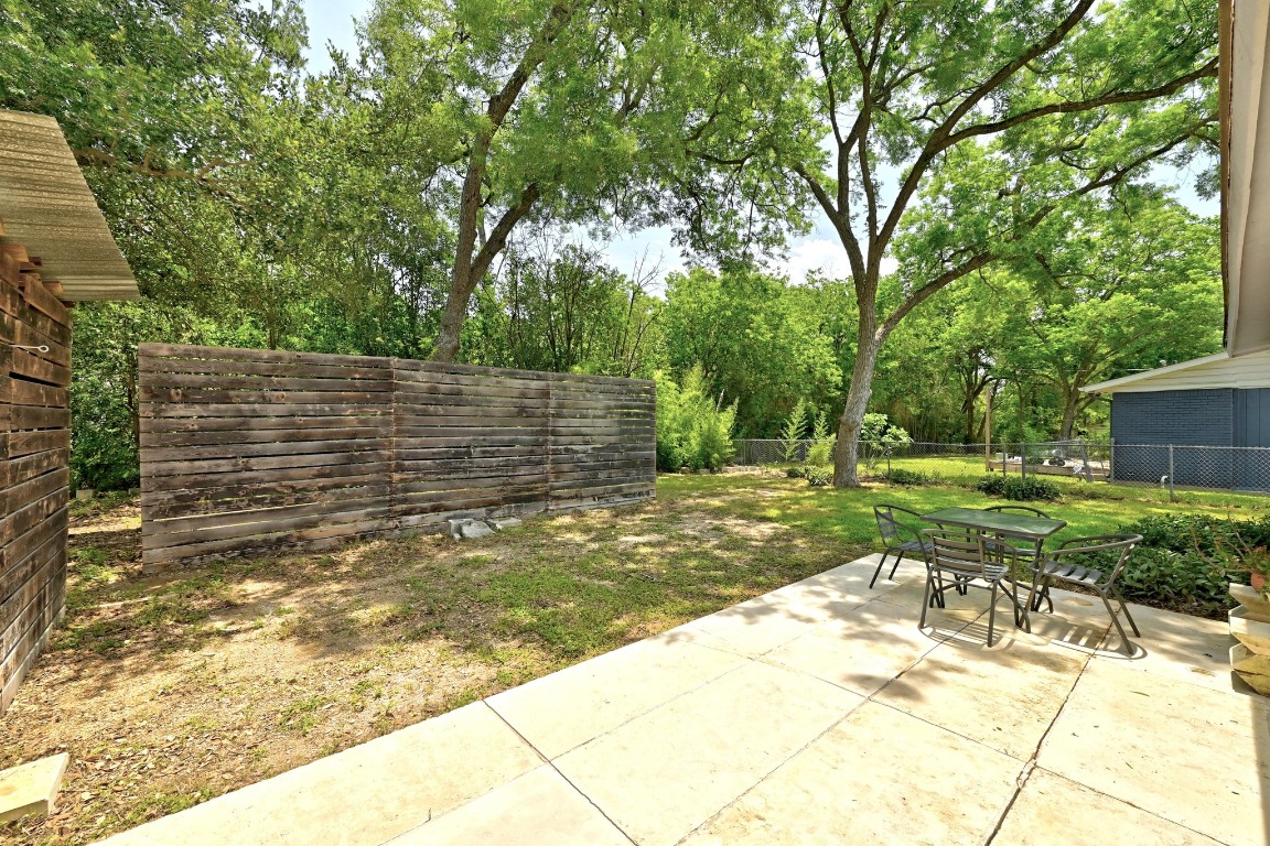 6209 Peggy Street Austin, TX 78723 - Photo 20 of 26 a view of backyard with wooden fence