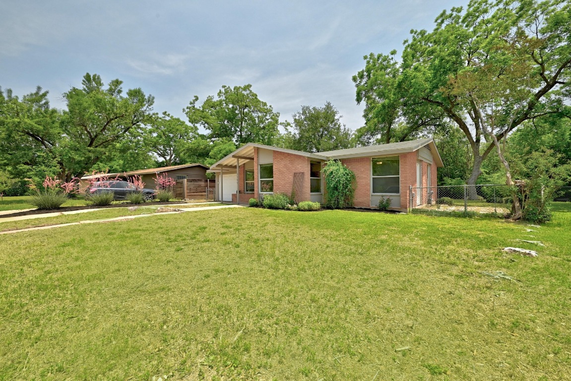 6209 Peggy Street Austin, TX 78723 - Photo 26 of 26 a house view with a garden space