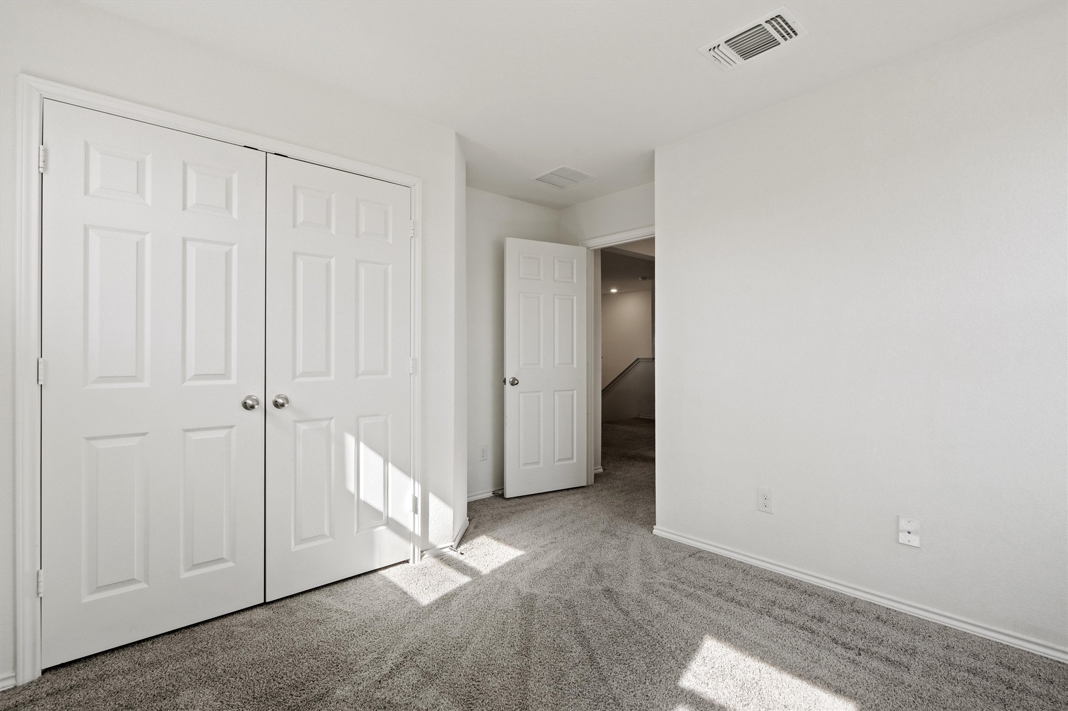 1901 Bogata Lane Leander, TX 78641 - Photo 28 of 40 Unfurnished bedroom featuring carpet flooring and a closet