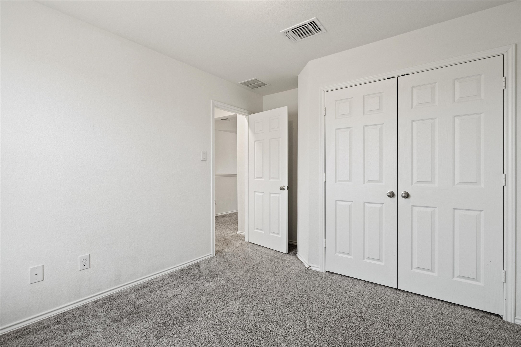 1901 Bogata Lane Leander, TX 78641 - Photo 29 of 40 Unfurnished bedroom with carpet floors and a closet