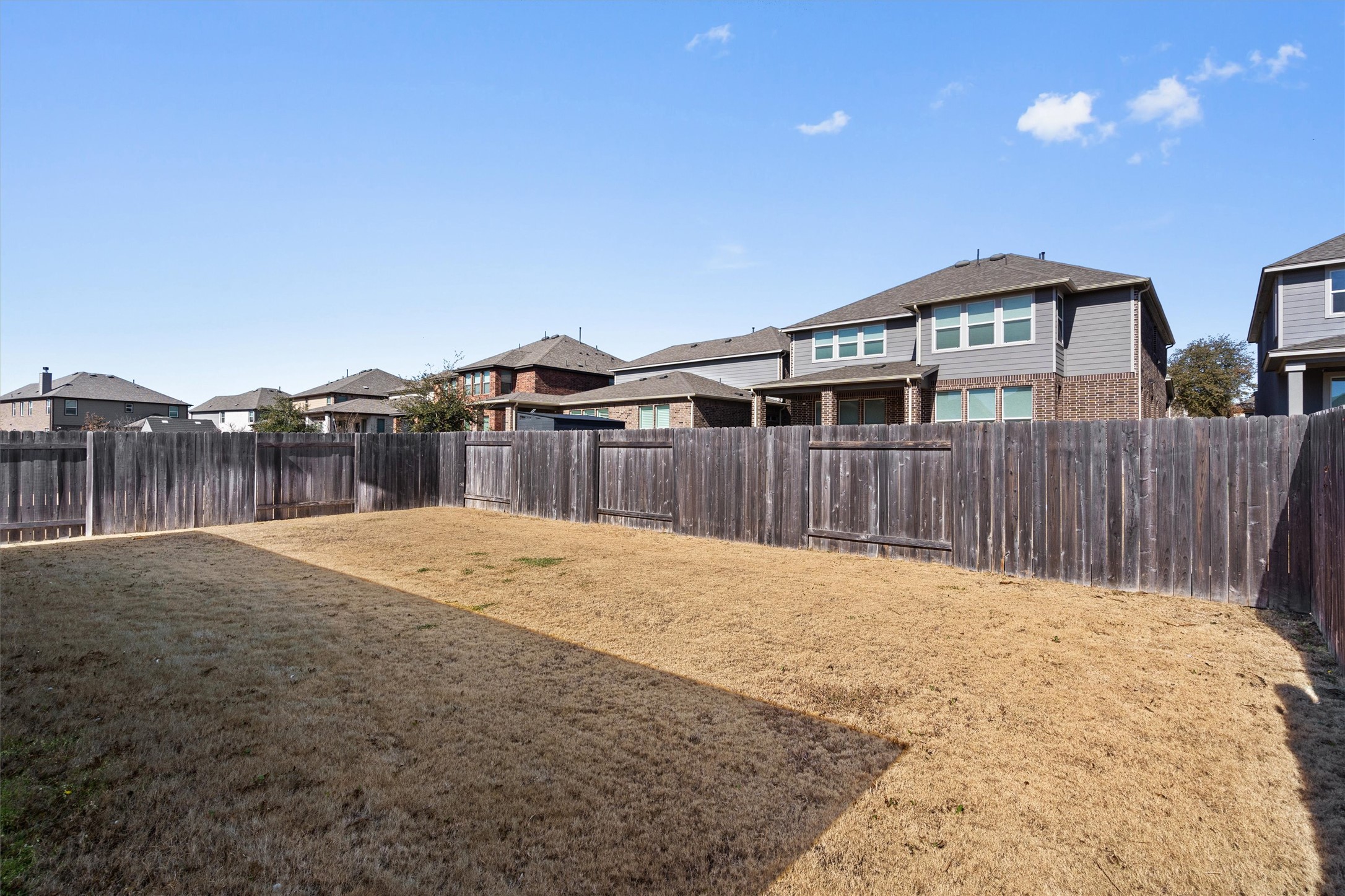 1901 Bogata Lane Leander, TX 78641 - Photo 33 of 40 Fenced backyard featuring a residential view