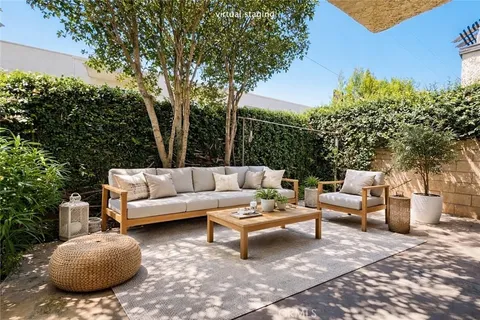 a outdoor living space with furniture and garden