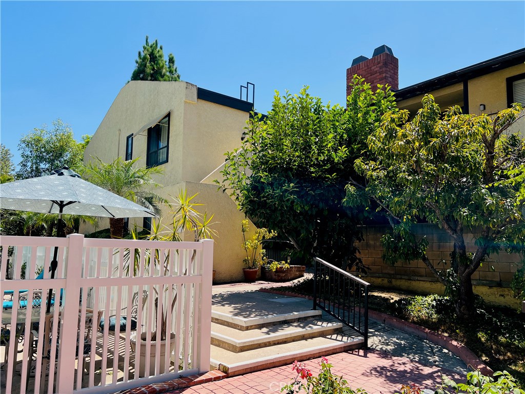 415 West Duarte Road, Unit 2 Arcadia, CA 91007 - Photo 28 of 30 a front view of a house with yard