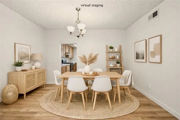 a view of a dining room with furniture