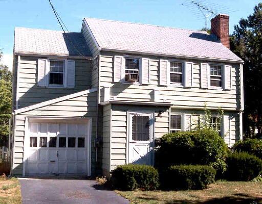 48 Southfield Road Fairfield, CT 06824 - Photo 1 of 1 a front view of a house with a yard
