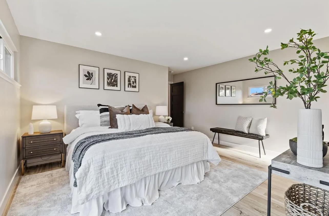 1439 Bittern Drive Sunnyvale, CA 94087 - Photo 11 of 28 a bedroom with a bed and a painting on the wall