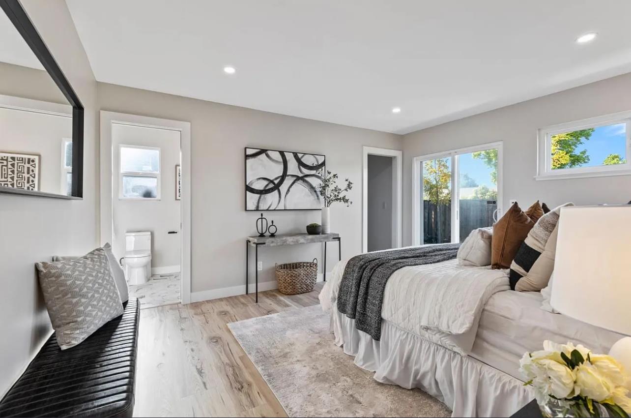 1439 Bittern Drive Sunnyvale, CA 94087 - Photo 12 of 28 a bedroom with a bed and a couch