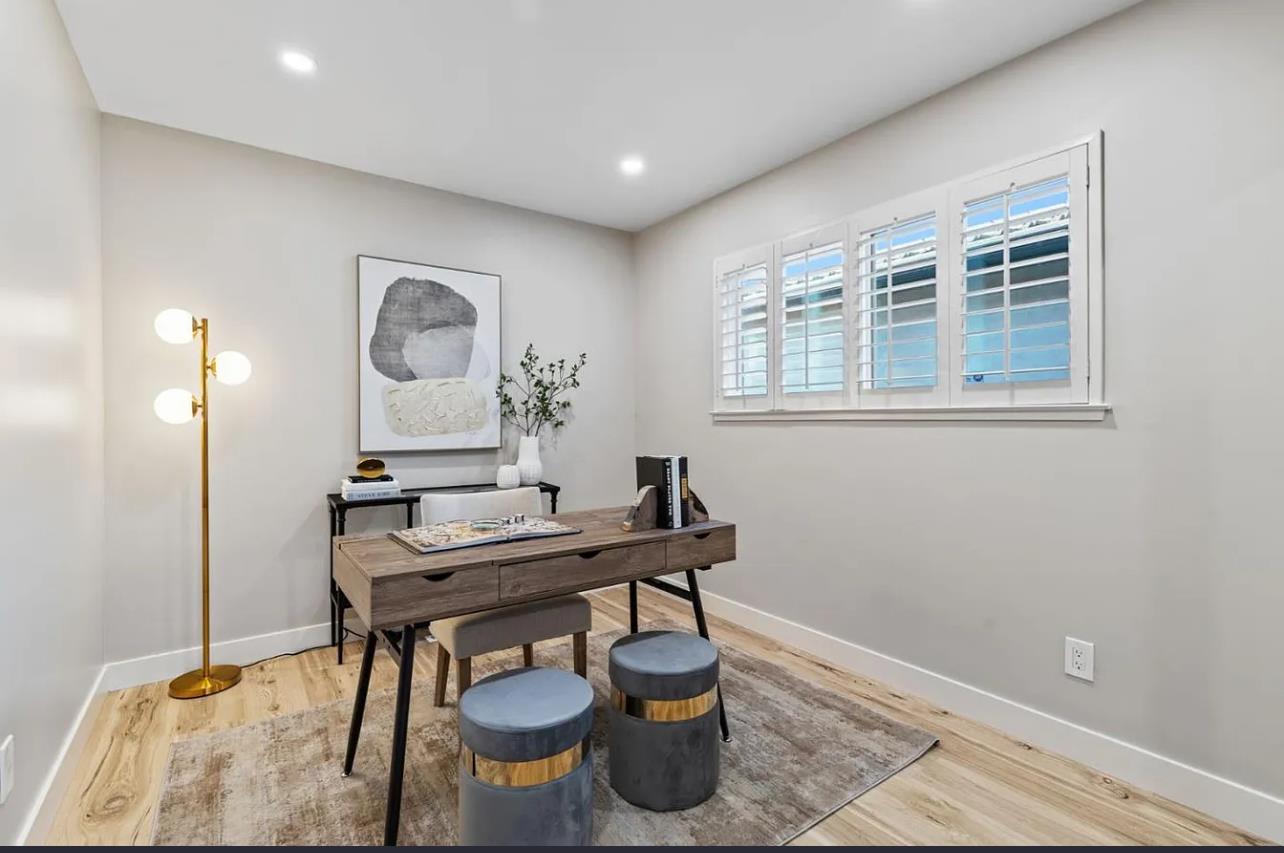 1439 Bittern Drive Sunnyvale, CA 94087 - Photo 15 of 28 a view of a workspace room with furniture and wooden floor