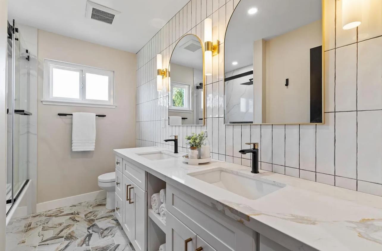 1439 Bittern Drive Sunnyvale, CA 94087 - Photo 17 of 28 a bathroom with a sink and a mirror