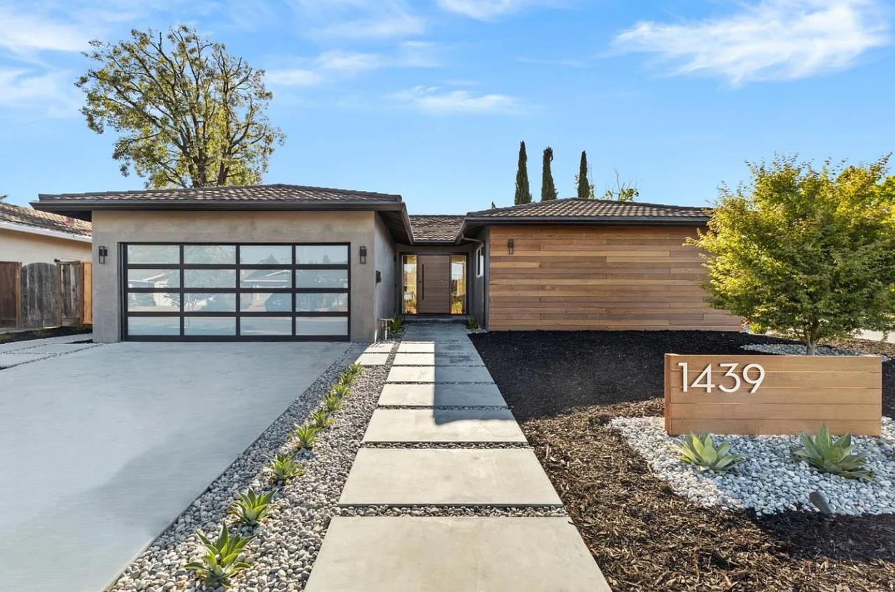 1439 Bittern Drive Sunnyvale, CA 94087 - Photo 23 of 28 a front view of a house with a yard
