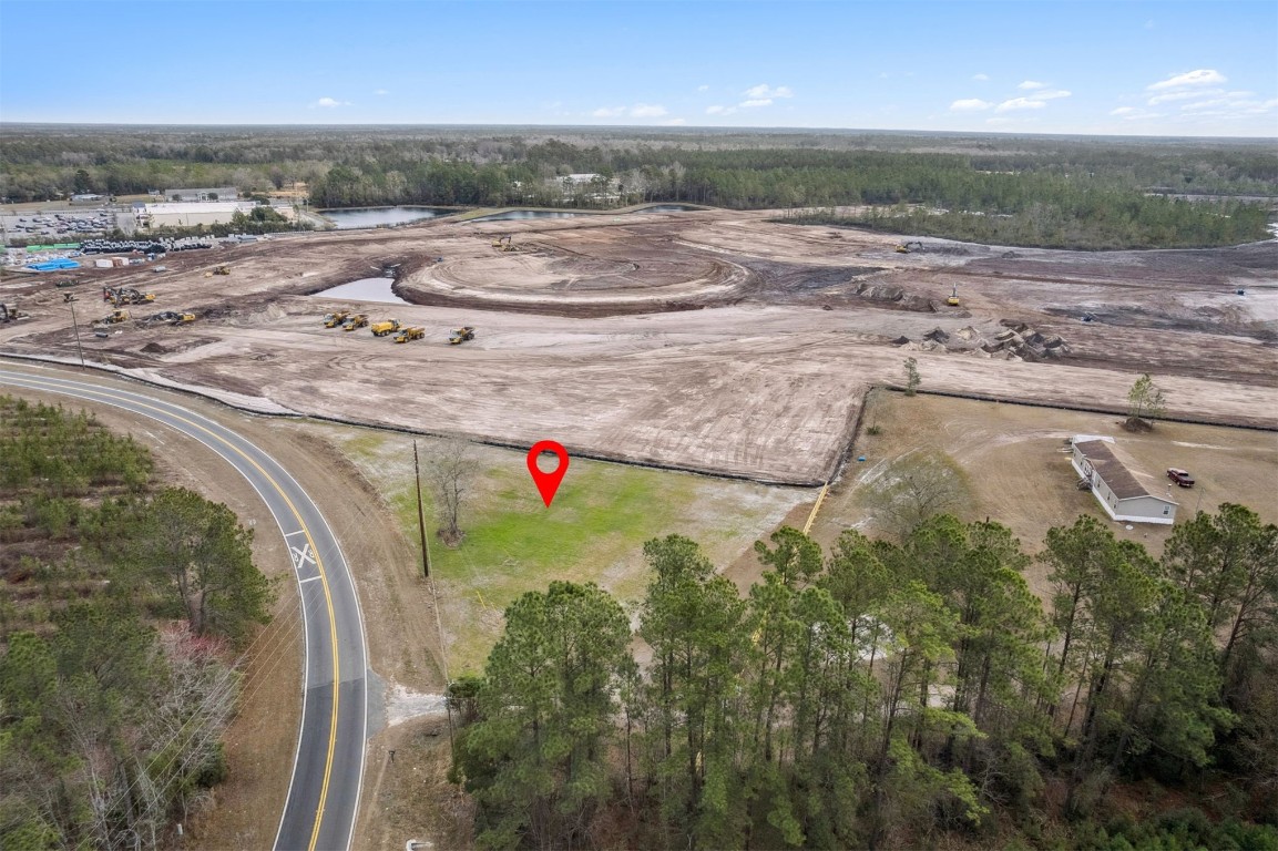 0 Henry Smith Road Hilliard, FL 32046 - Photo 7 of 9 a view of outdoor space and city view