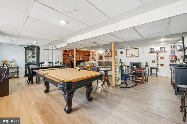 a room with lots of furniture and gym equipment