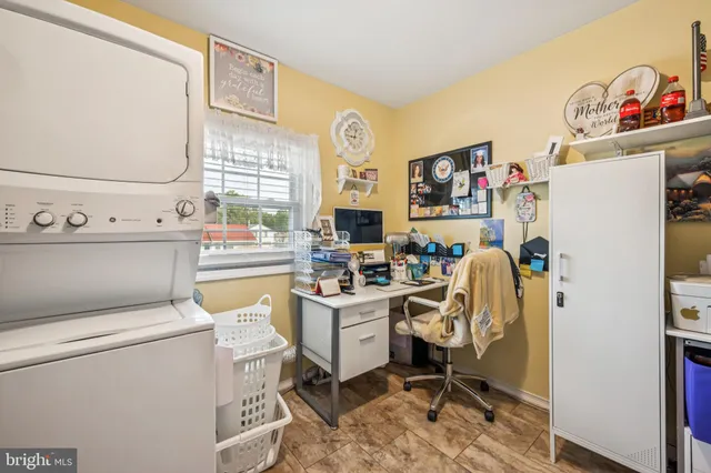 a view of a workspace with furniture and toys