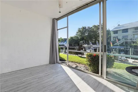 a view of swimming pool from a balcony