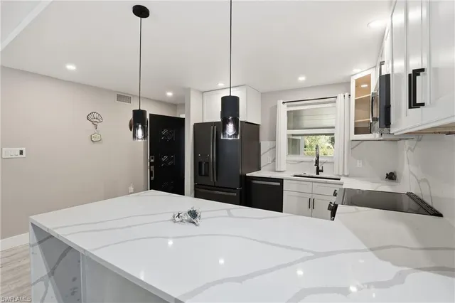 $435,000 | 1320 Blue Point Avenue, Unit 2, Naples, FL 34102