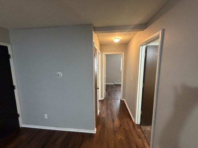 107 College Park Court, Unit 2 Normal, IL 61761 - Photo 5 of 8 a view of hallway with wooden floor
