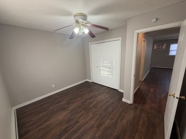 107 College Park Court, Unit 2 Normal, IL 61761 - Photo 7 of 8 a view of an empty room with wooden floor