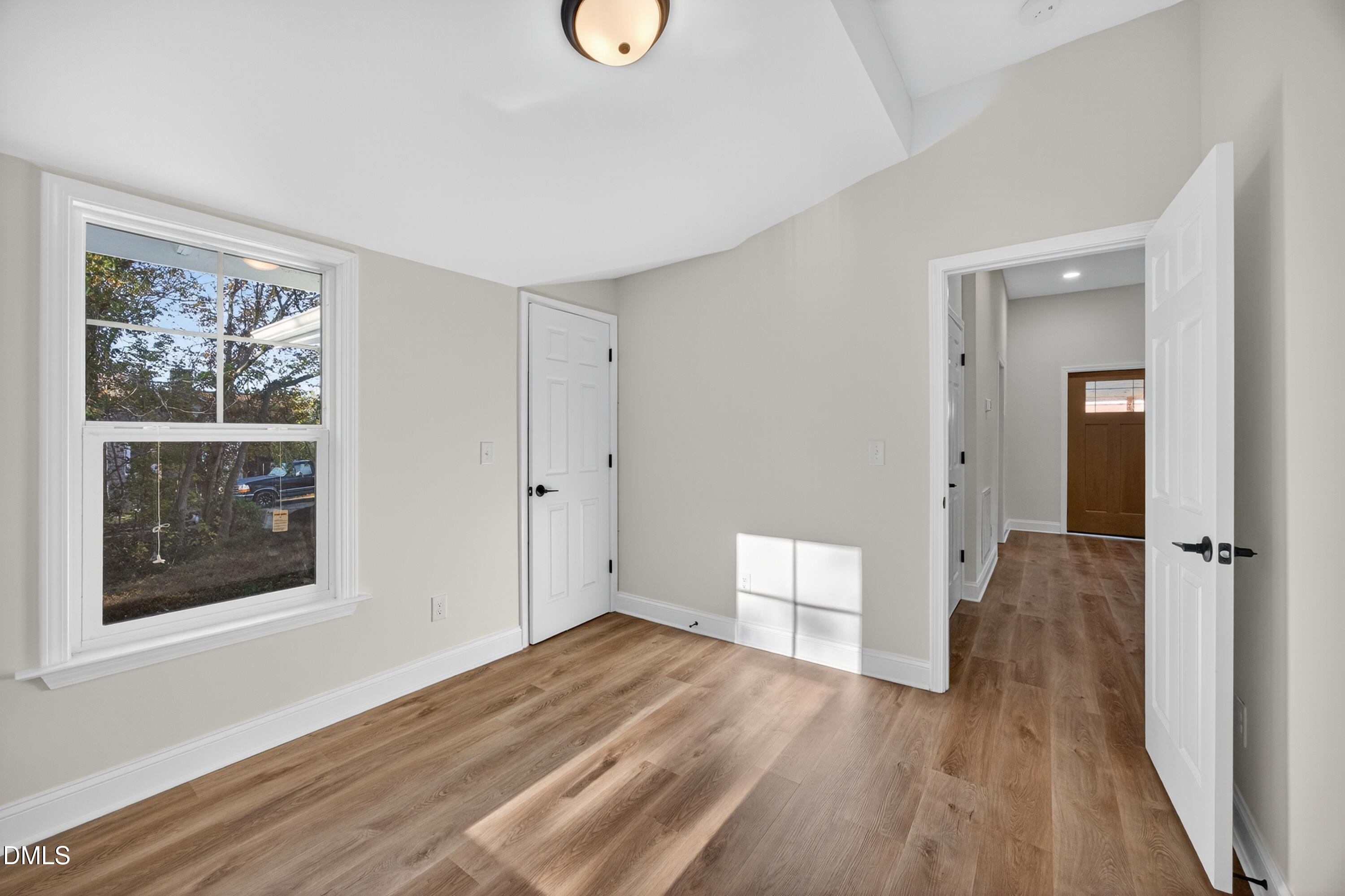 1043 George Bason Road Graham, NC 27253 - Photo 15 of 30 a view of a room with wooden floor and windows