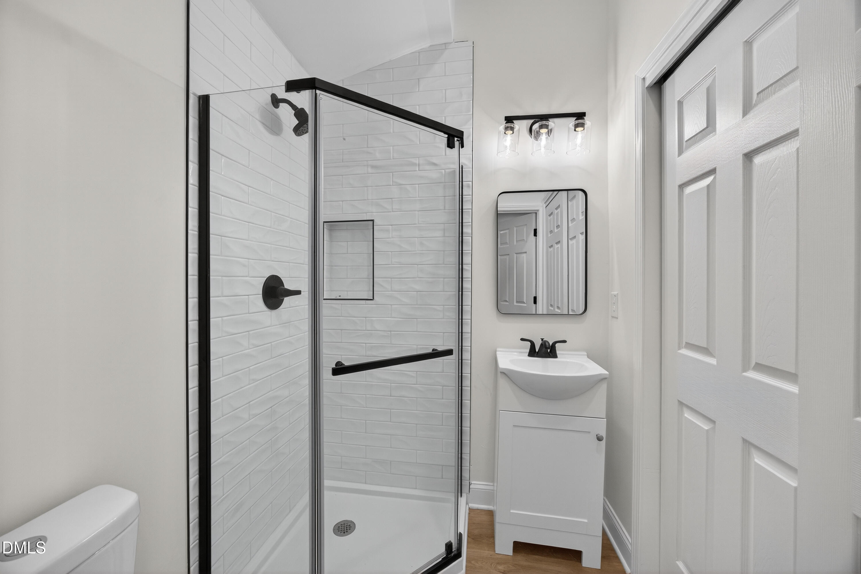 1043 George Bason Road Graham, NC 27253 - Photo 16 of 30 a bathroom with a sink mirror and toilet