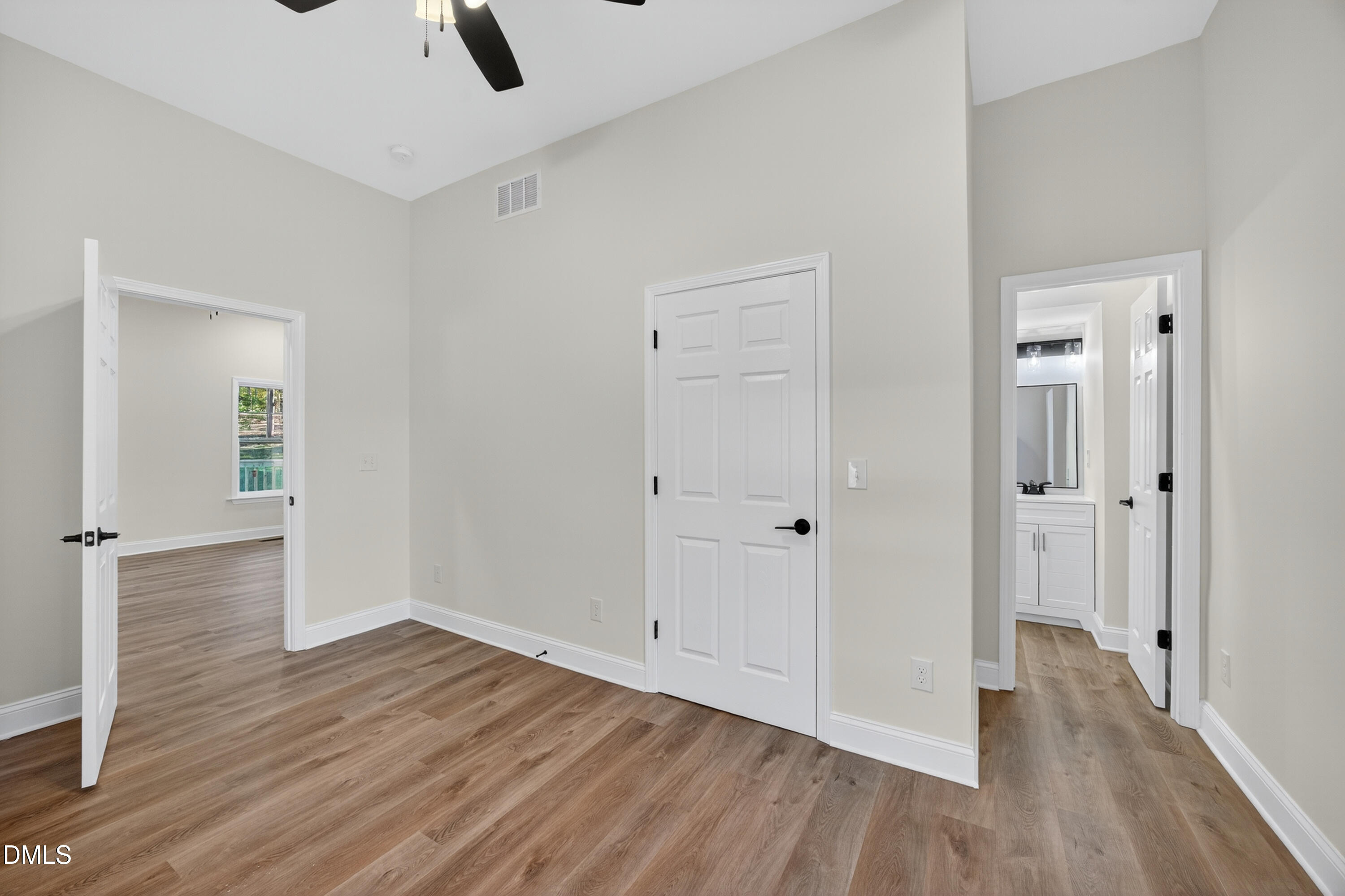 1043 George Bason Road Graham, NC 27253 - Photo 18 of 30 wooden floor in an empty room with a window