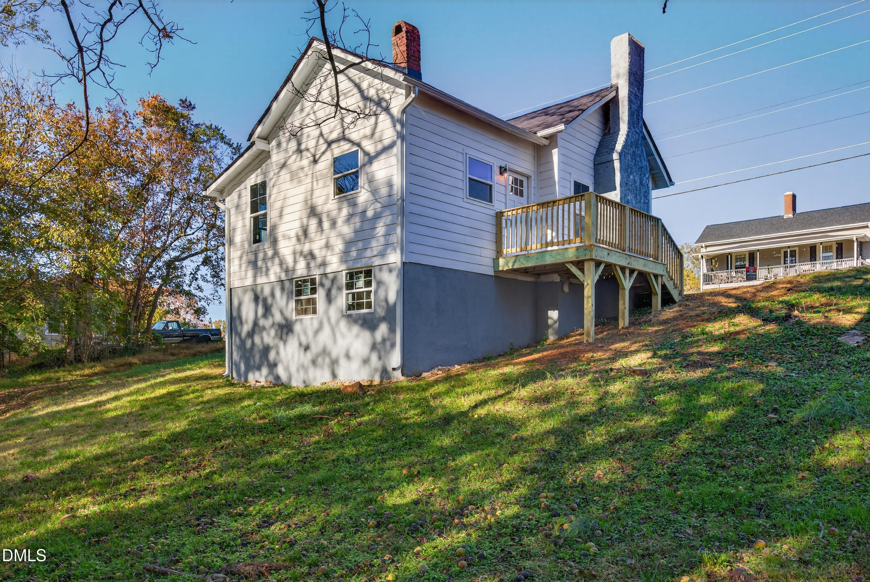 1043 George Bason Road Graham, NC 27253 - Photo 22 of 30 a view of a house with a yard