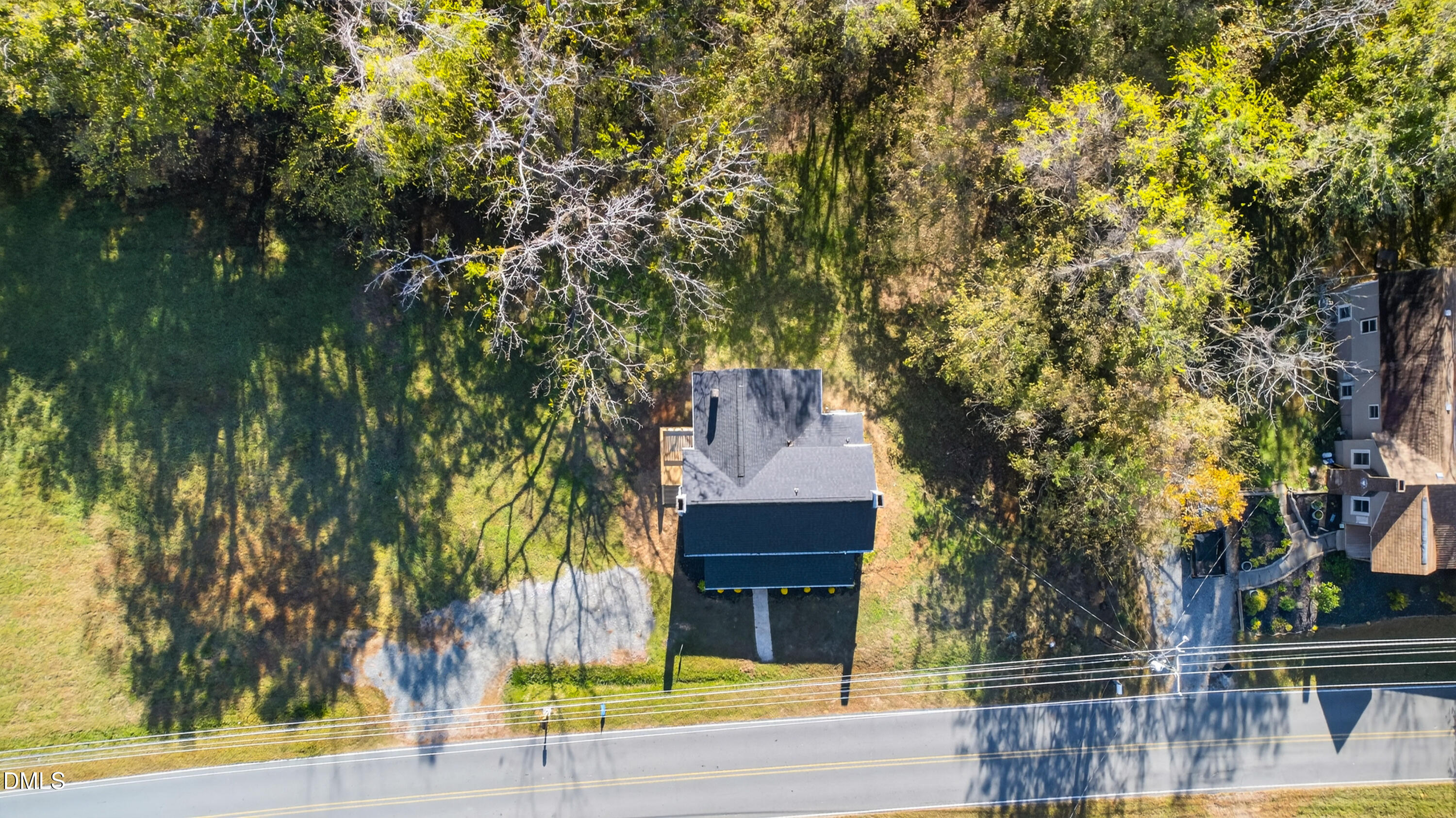 1043 George Bason Road Graham, NC 27253 - Photo 29 of 30 front view of a house with a tree