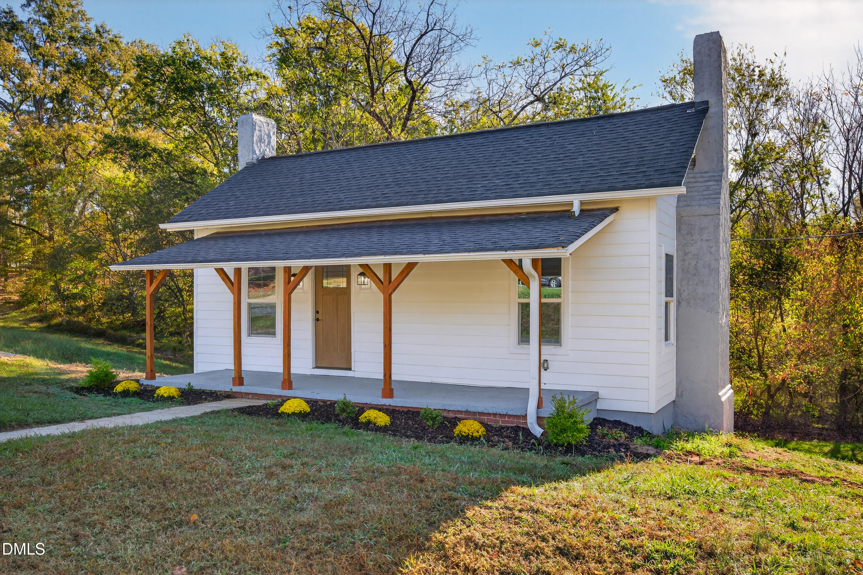 1043 George Bason Road Graham, NC 27253 - Photo 4 of 30 front view of a house with a yard