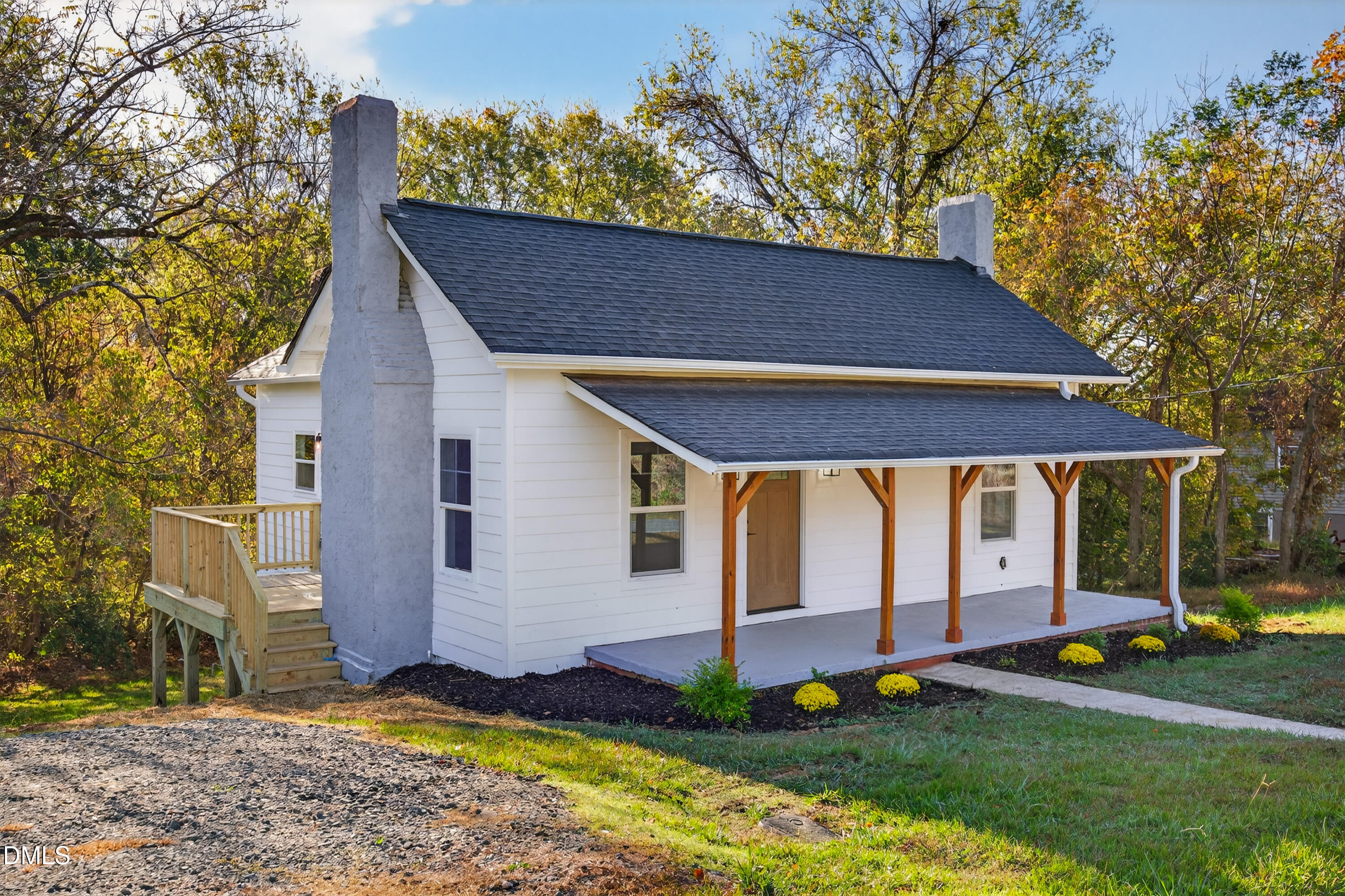 1043 George Bason Road Graham, NC 27253 - Photo 5 of 30 a backyard of a house with lots of green space