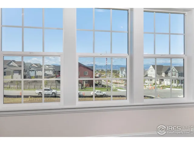 a bathroom with a granite countertop sink mirror and double