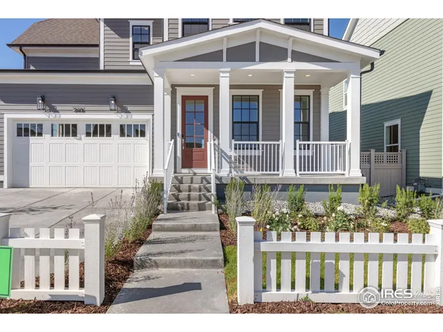 a front view of a house with a porch