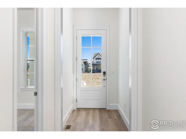 a living room with a fireplace and a fireplace