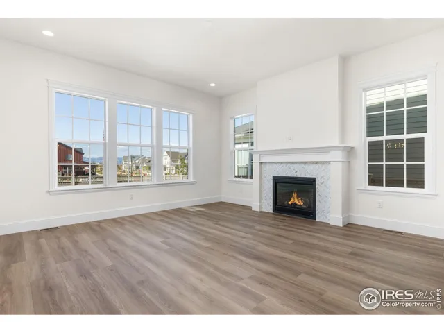 a view of kitchen with kitchen island a sink appliances and a counter top space