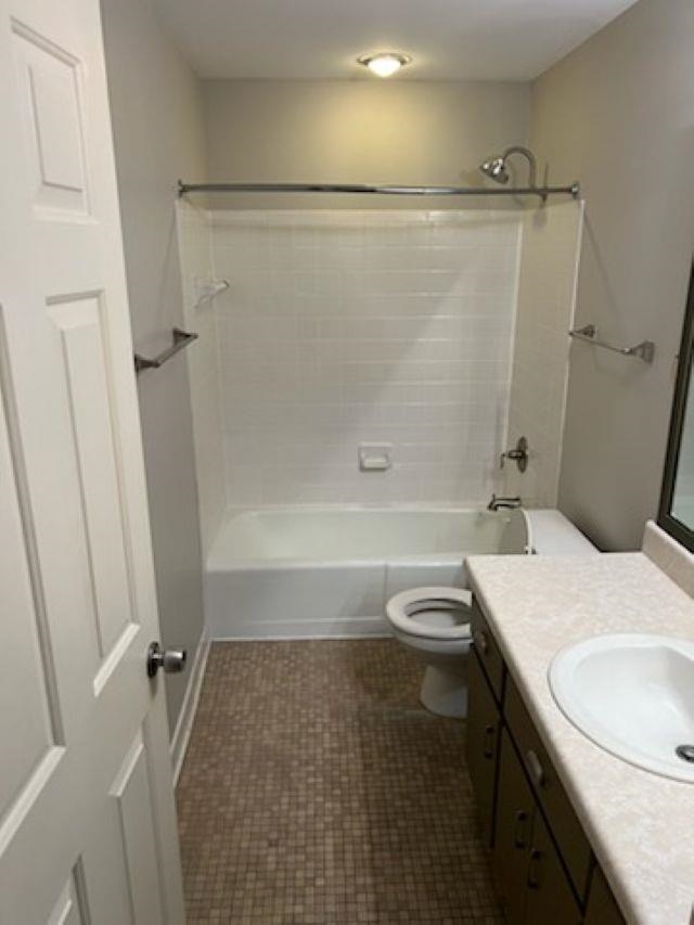 2277 Union Avenue, Unit 103 Memphis, TN 38104 - Photo 12 of 17 a bathroom with a sink a toilet and shower