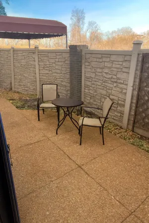 a view of a terrace with chairs