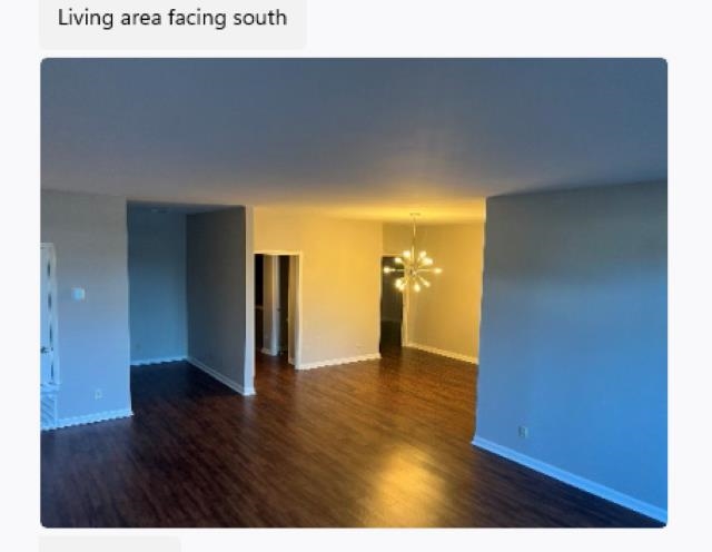 2277 Union Avenue, Unit 103 Memphis, TN 38104 - Photo 2 of 17 a view of an empty room with wooden floor and closet