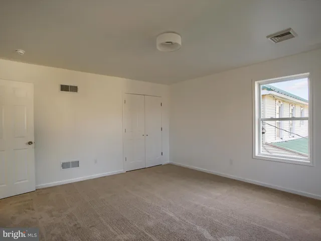 a view of a building with a street