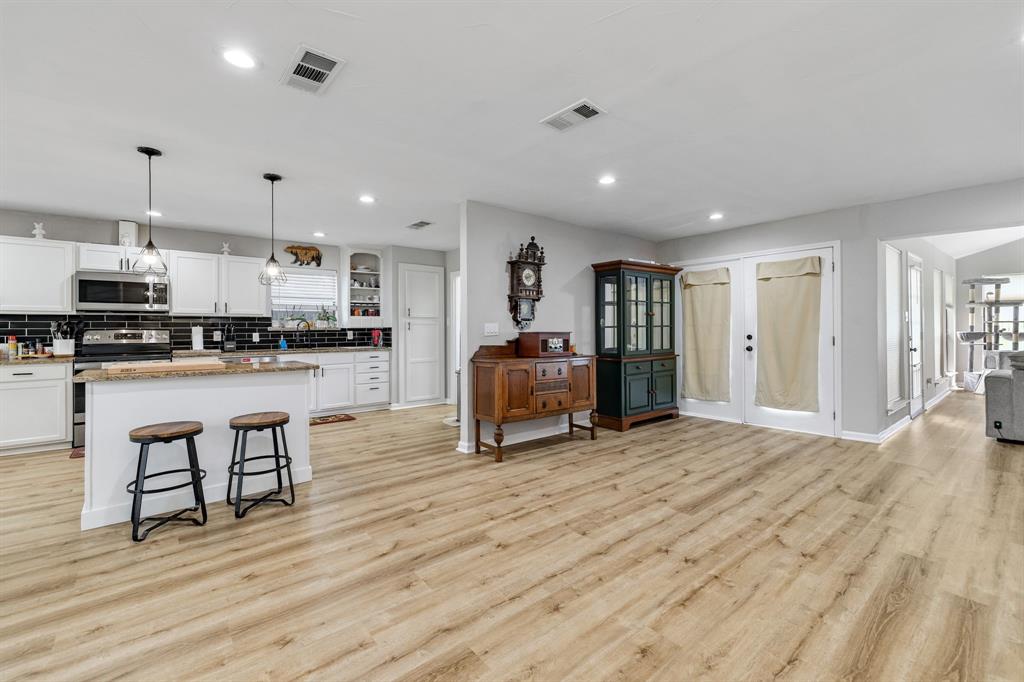 191 Klutts Road McLendon-Chisholm, TX 75032 - Photo 11 of 40 a living room with furniture and kitchen view