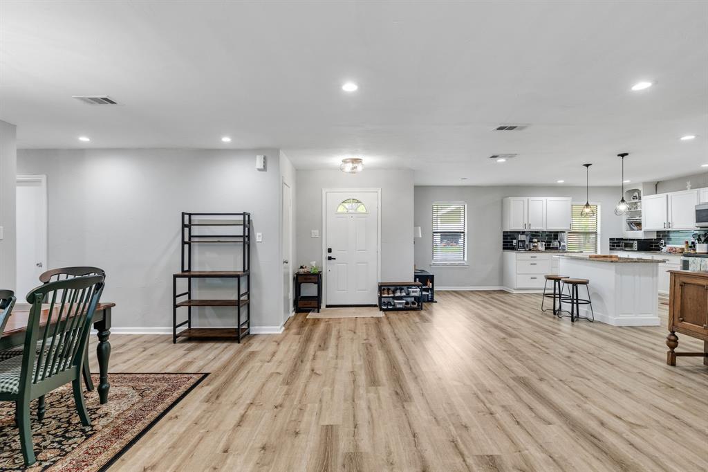 191 Klutts Road McLendon-Chisholm, TX 75032 - Photo 12 of 40 a view of kitchen with refrigerator stove and wooden floor