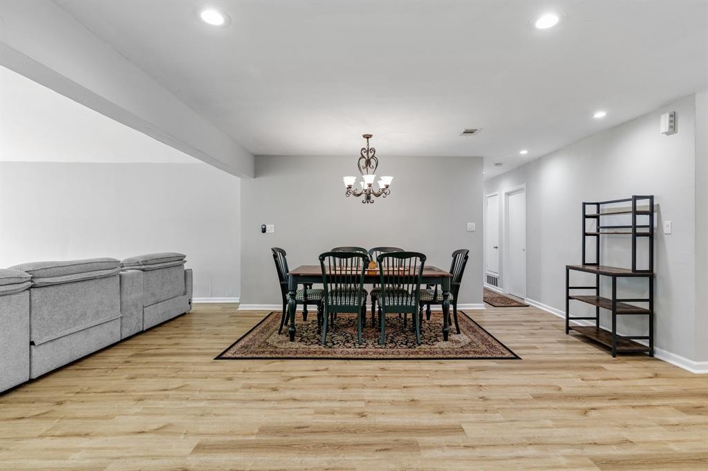 191 Klutts Road McLendon-Chisholm, TX 75032 - Photo 13 of 40 a view of a dining room with furniture and wooden floor