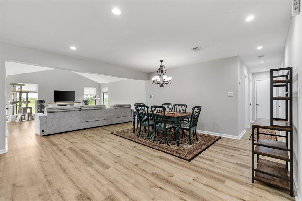 191 Klutts Road McLendon-Chisholm, TX 75032 - Photo 14 of 40 a view of a dining room with furniture and chandelier