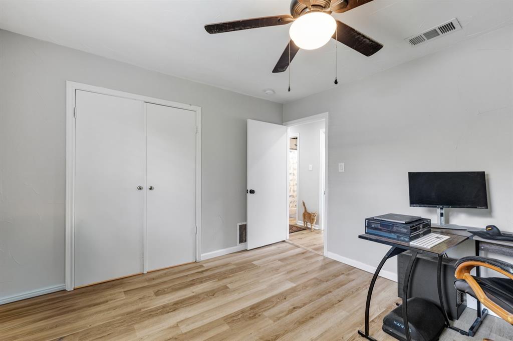 191 Klutts Road McLendon-Chisholm, TX 75032 - Photo 29 of 40 a view of a workspace with furniture and wooden floor